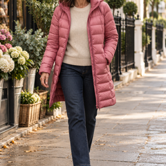 The Elara Lightweight Jacket in pink, worn on a London street